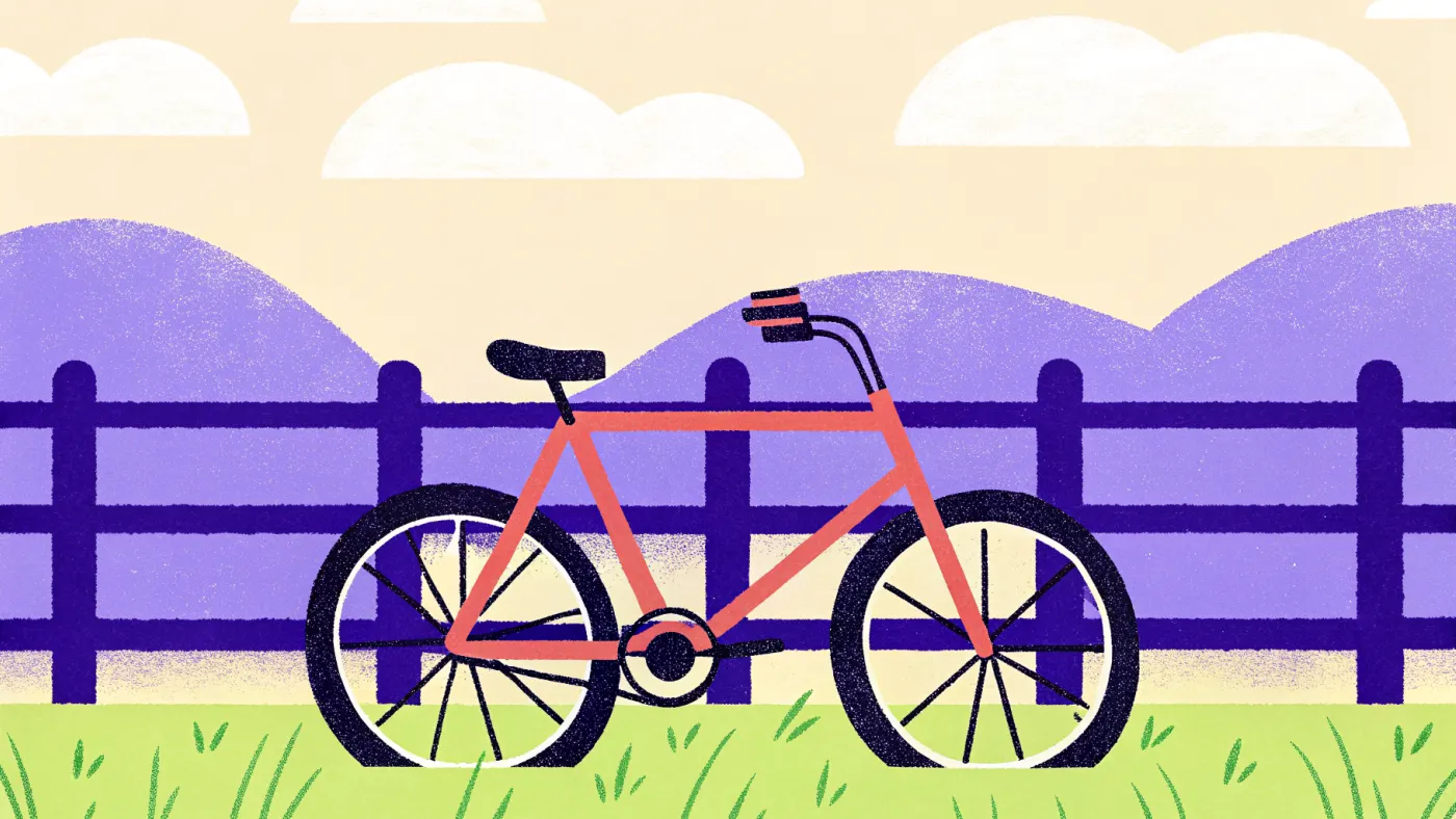 Een fiets met bepakking tegen een hek, met een telefoon op het stuur waarop een wolk van reacties verschijnt