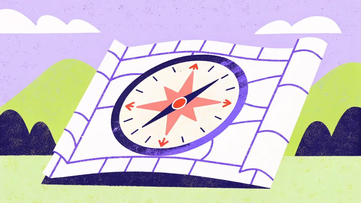 Een niche kiezen is richting kiezen: één onderwerp, en daar alles over Een kompas op een opengevouwen landkaart met daaromheen een paar gekleurde spelden