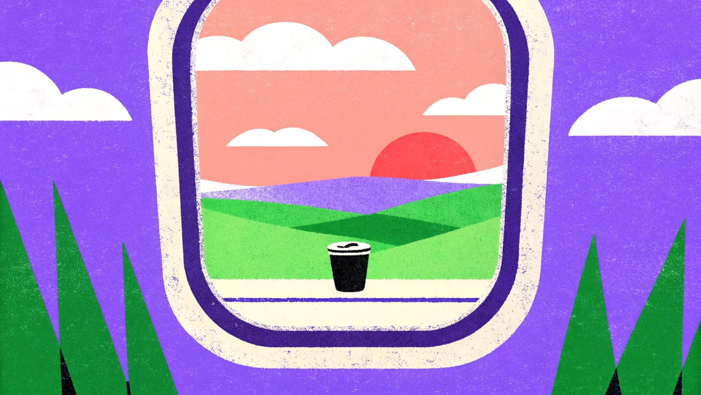Cabin attendant: de wereld zien terwijl je werkt Uitzicht vanuit een vliegtuigraam met een koffiekopje op het tafeltje